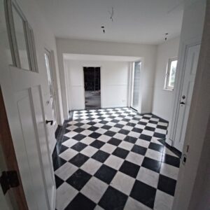 Wit en zwart marmer 30.5x30.5x1 getrommeld