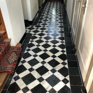 Wit en zwart marmer getrommeld patroon vloertegel